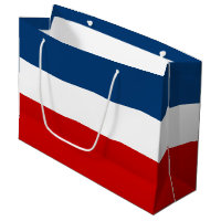 O saco branco e azul vermelho do presente -