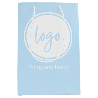 SACOLA PARA PRESENTES MÉDIA NEGÓCIO MARCADO COM NOME E LOGOTIPO DA EMPRESA EM 