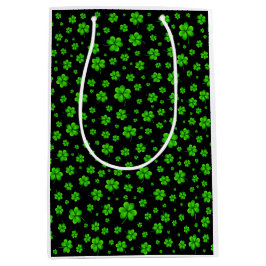 Sacola Para Presentes Média Pattern of green shamrocks on black background