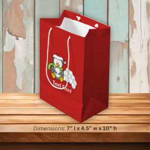 Sacola Para Presentes Média Pinguim de Natal sentado com bolas de neve