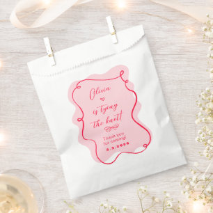Sacolinha Ela é casando rosa e obrigado vermelha