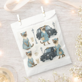 Sacolinha Gato com táxi preto em Londres, Inglaterra