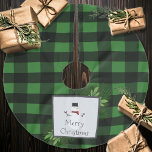 Saia Para Árvore De Natal De Poliéster Xadrez de Buffalo Verde Snowman | Verde e Preto<br><div class="desc">Adicione um charme acolhedor à sua decoração de feriado com esta saia de Natal Xadrez Búfalo Verde e Negra. Apresentando um bonitão alegre com um chapéu clássico e um cachecol, o design é acentuado com a festiva pátria de pinheiro de férias e uma xadrez de búfalo ousada e padrão de...</div>
