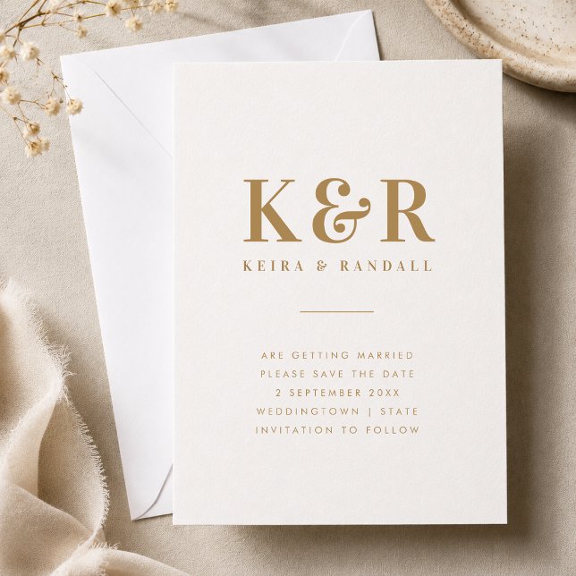 Salve a Data | Anúncio de Casamento com Monograma  (Gold monogram save the date card with couple initials, names, date, and location details.)