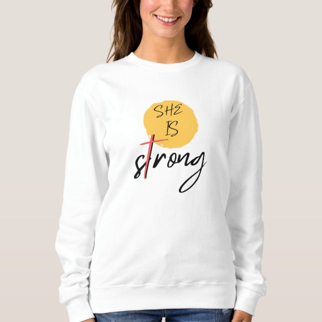 She Is Strong Cross Graphic T-Shirt (Frente)