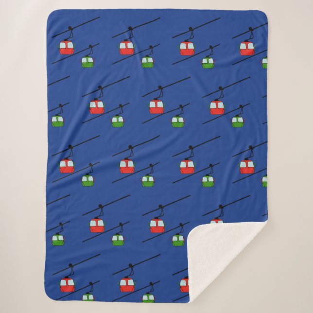 Sherpa gondolas vermelhas e verdes no cobertor azul. (Frente)