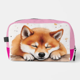 shiba ganhando mala de higiene tricolor sonolenta