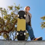 Skate Bold Black with Metallic Gold Unique Stylish<br><div class="desc">This bold black skateboard with metallic gold accents offers a striking, stylish design for riders seeking both performance and flair. Built for durability and smooth riding, it’s ideal for cruising, tricks, or casual skating. The black and gold contrast adds a modern, eye-catching touch, making this skateboard a functional ride and...</div>