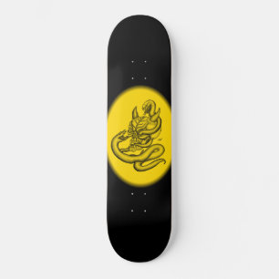 Skate Caveira - cabeças do diabo com cobra