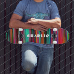 Skate Nome Personalizado de Strips Modernos Coloridos do<br><div class="desc">Abstrato moderno colorido Stripes Personalizado Nome do skate apresenta o seu nome personalizado em tipografia moderna num fundo listrado colorido. Personalize editando o texto na caixa de texto fornecida. Dê um presente personalizado, skate personalizado ao seu skate favorito para o Natal, aniversário ou seu melhor amigo. Elaborado por ©Evco Studio...</div>