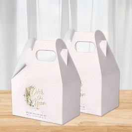 Sobre a caixa Dourada de poeira e nuvens da Lua