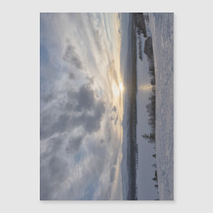 Sunset over frozen lake