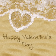 "Happy Valentine's Day" written in the sand