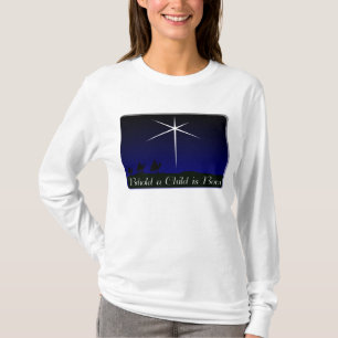 T-shirt A natividade uma criança é nascida