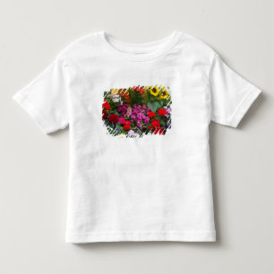 T-shirt Cerca de estacas amarelas com jardim de flores em