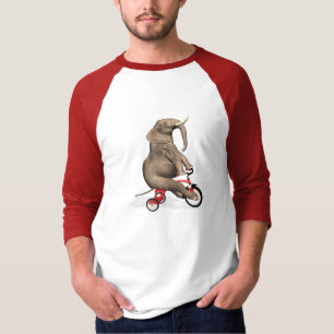 T-shirt Elefante bonito que monta um triciclo