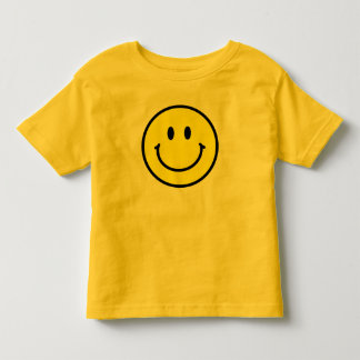 T-shirt feliz da criança da cara