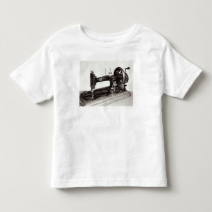 T-shirt "Máquina de costura da família nova" do cantor,
