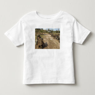 T-shirt Os fuzileiros navais dos E.U. fornecem a seguranç