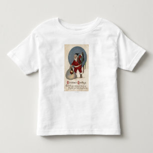 T-shirt Papai noel que enche a meia à borda