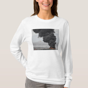 T-shirt Queimaduras de óleo concentrado coletadas