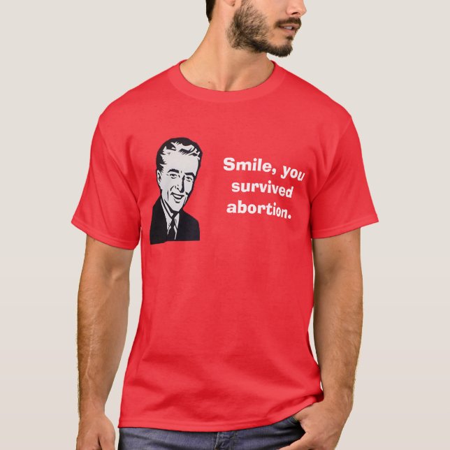 T-shirt Sorriso, você sobreviveu ao aborto (Frente)