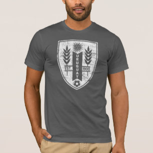 T-shirt T da crista de Uruguai