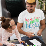 T-shirt Terapêutica Ocupacional Bonita Pergunte-Me Sobre O<br><div class="desc">Uma camiseta fofa para o melhor terapeuta ocupacional do mundo. Um presente que diz "Pergunte-me sobre a terapia ocupacional" em vermelho, verde e azul com um golfinho bonito. Um presente de excelente para crianças OT. As crianças beneficiam muito da terapia ocupacional. *As imagens utilizadas neste item são licenciadas e ©...</div>