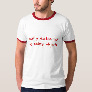 T-shirts confundido facilmente, por objetos brilhantes