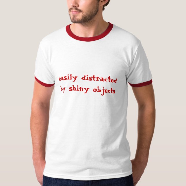 T-shirts confundido facilmente, por objetos brilhantes (Frente)