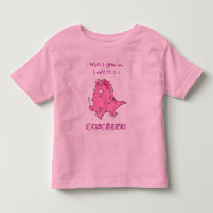 T-shirts cresça acima o rosa do dinossauro