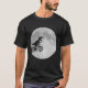 T-shirts Dinossauro em bicicleta no céu com lua (Frente)