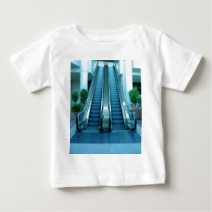 T-shirts escada rolante