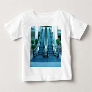 T-shirts escada rolante