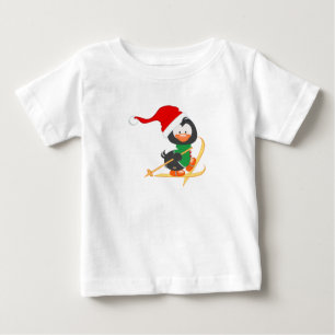 T-shirts Esqui do pinguim do Natal