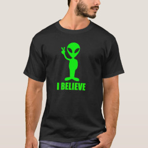T-shirts Eu acredito o design verde do UFO da alienígena