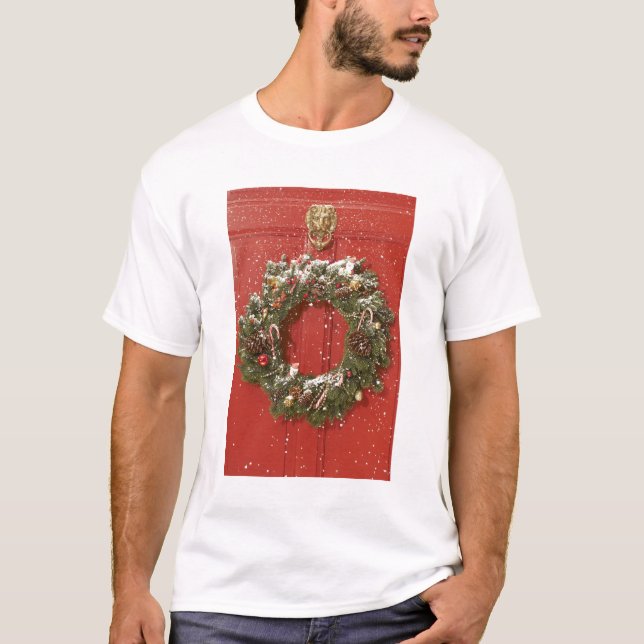 T-shirts Grinalda do Natal que pendura em uma porta (Frente)