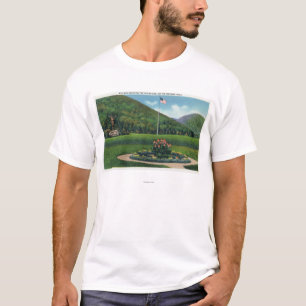 T-shirts Indiano que cumprimenta a estátua de Sun de