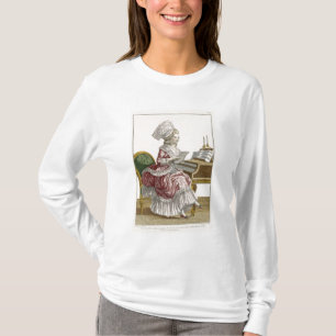 T-shirts Jovem mulher que estuda a música em seu cravo, pl