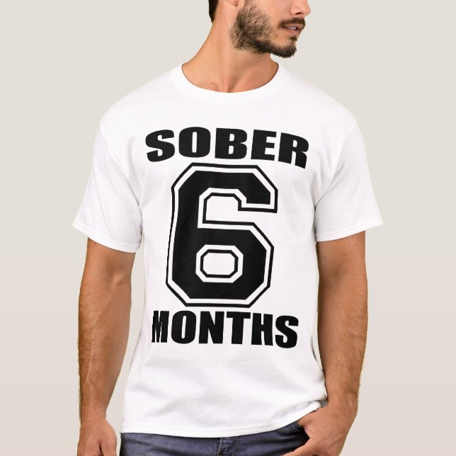 T-SHIRTS MODERE 6 MESES DE PRETO NO TANQUE BRANCO (Frente)
