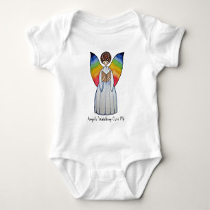 T-shirts O anjo da aguarela com arco-íris voa lendo um