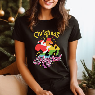 T-shirts O Natal é Mágico Papai Noel Cavalgando Unicórnio E