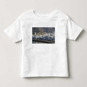 T-shirts Omã, Mascate, Mutrah. Edifícios ao longo de Mutrah