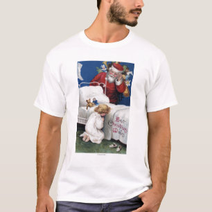T-shirts Papai noel que olha Praying da menina