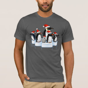 T-shirts Partido do pinguim do Natal