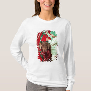 T-shirts Rapaz pequeno que decora um cão