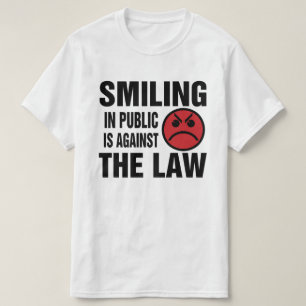 T-shirts Sorrir em Público é Contra a Lei