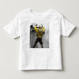 T-shirts Um diretor dos aviões sinaliza um zangão de