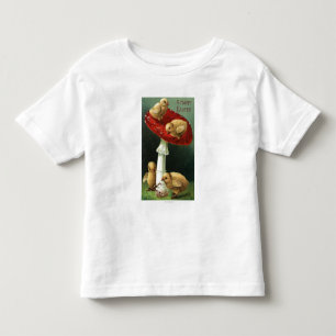 T-shirts Um EasterChicks feliz no cogumelo vermelho