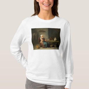 T-shirts Uma mulher em uma cozinha